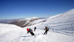 Skiers enjoying a run at Mt. Dobson